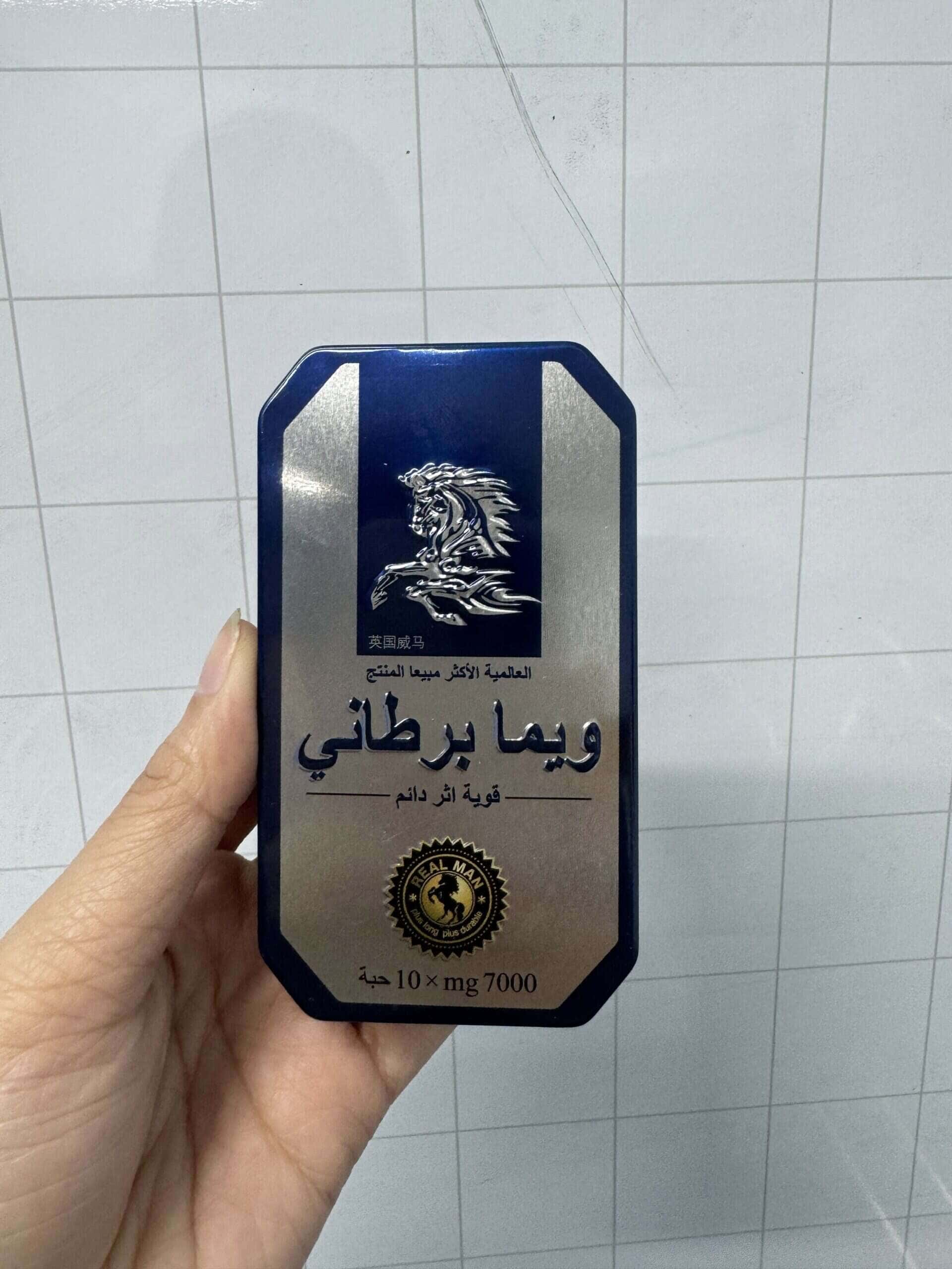 Customer holding Thai Horse gold stamp box