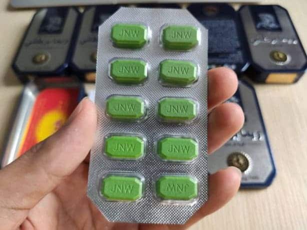 Genuine Thai Horse capsule in hand